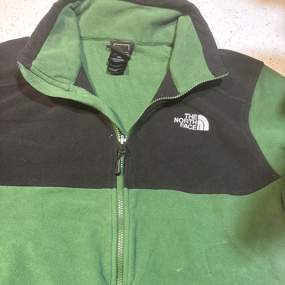 The north face green jacket.